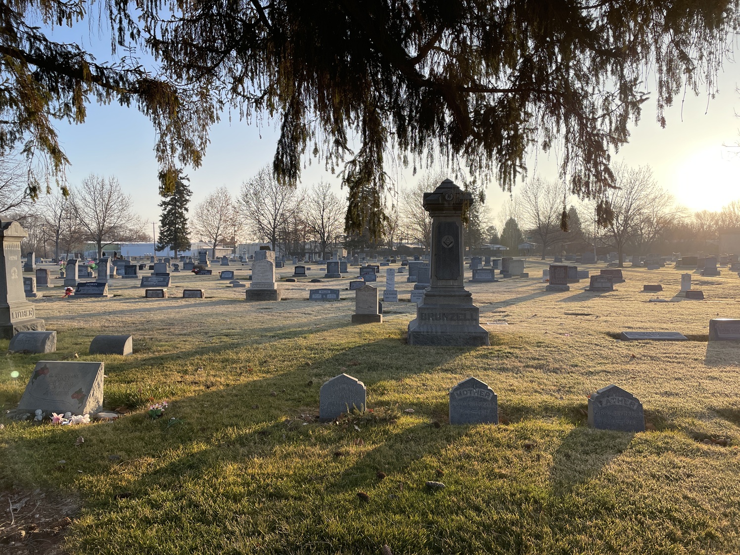 Kohlerlawn Headstones amongst tall trees